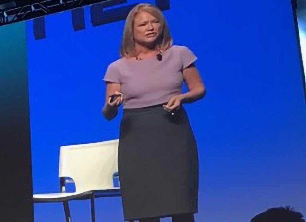 Sandra Wheatley Smerdon presenting on stage at conference